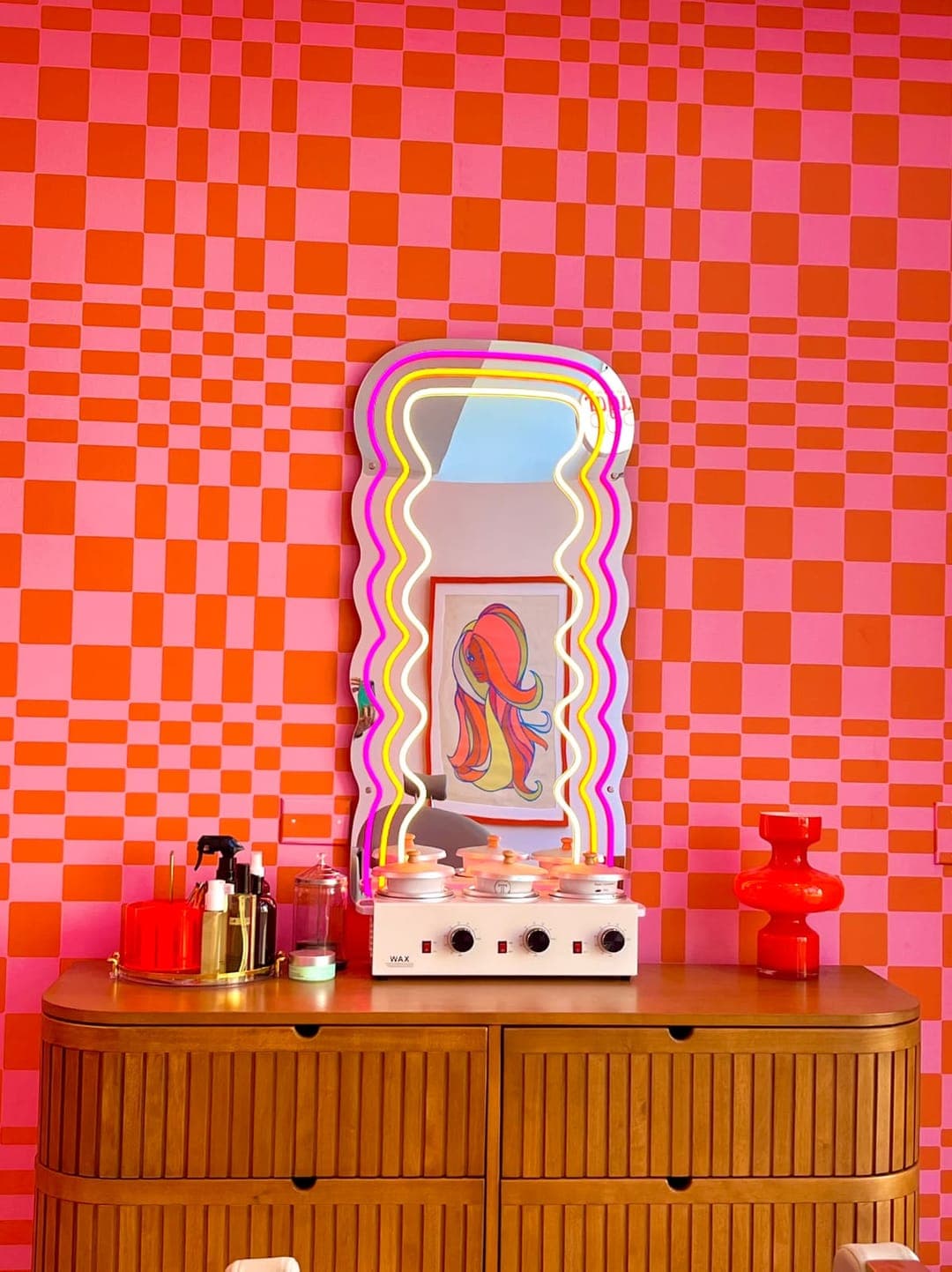 Aftercare products on the dresser at Sugar Pop Salon
